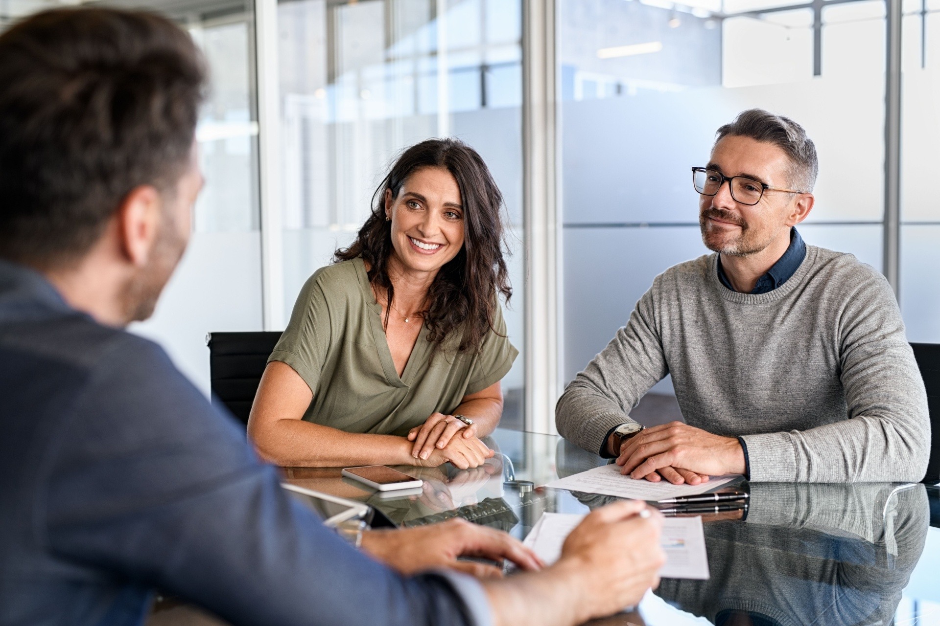 Couple discovering the difference between regulated and unregulated bridging loans